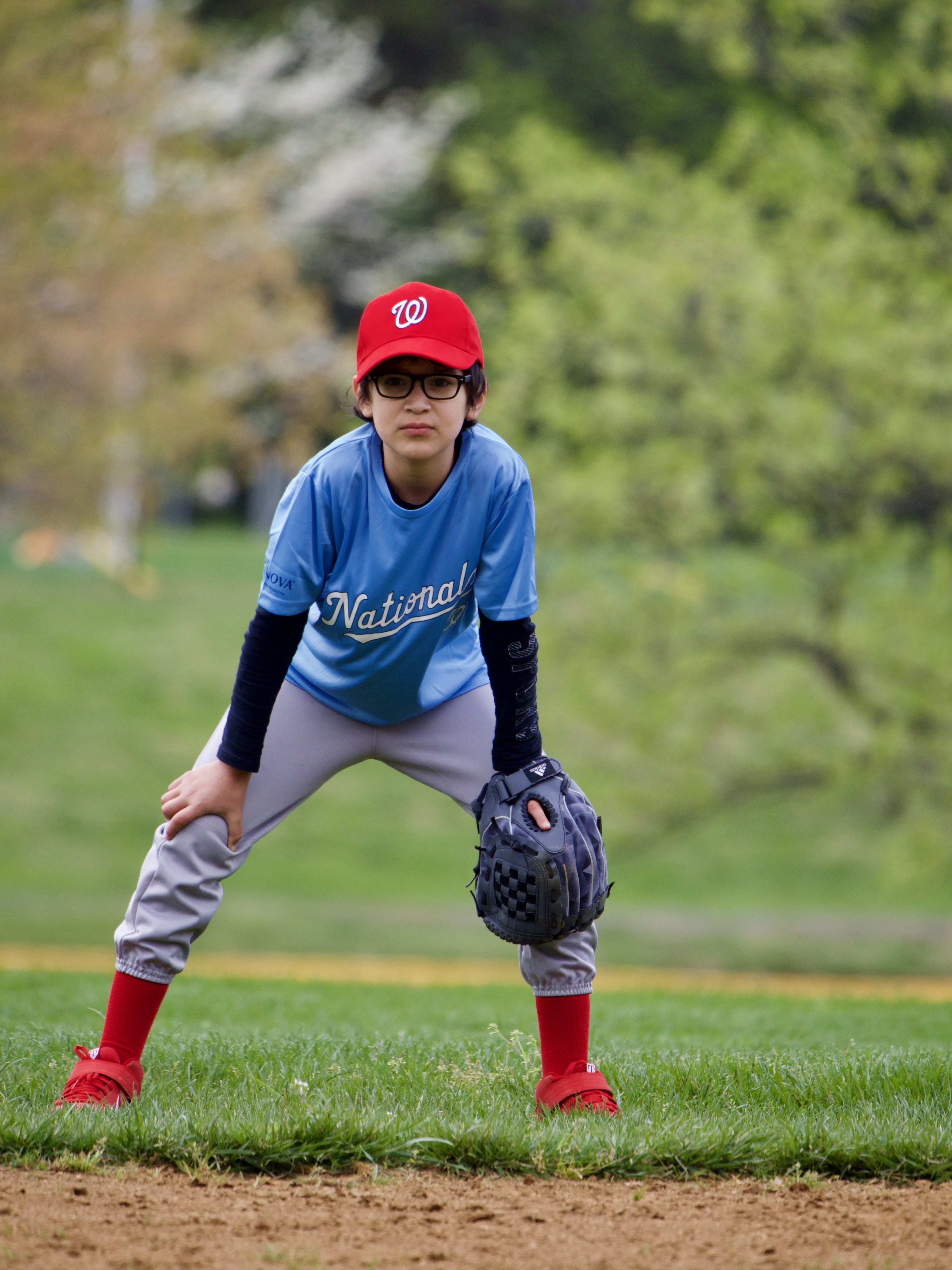 Pioneer Baseball League House Ball player focuses on the ball